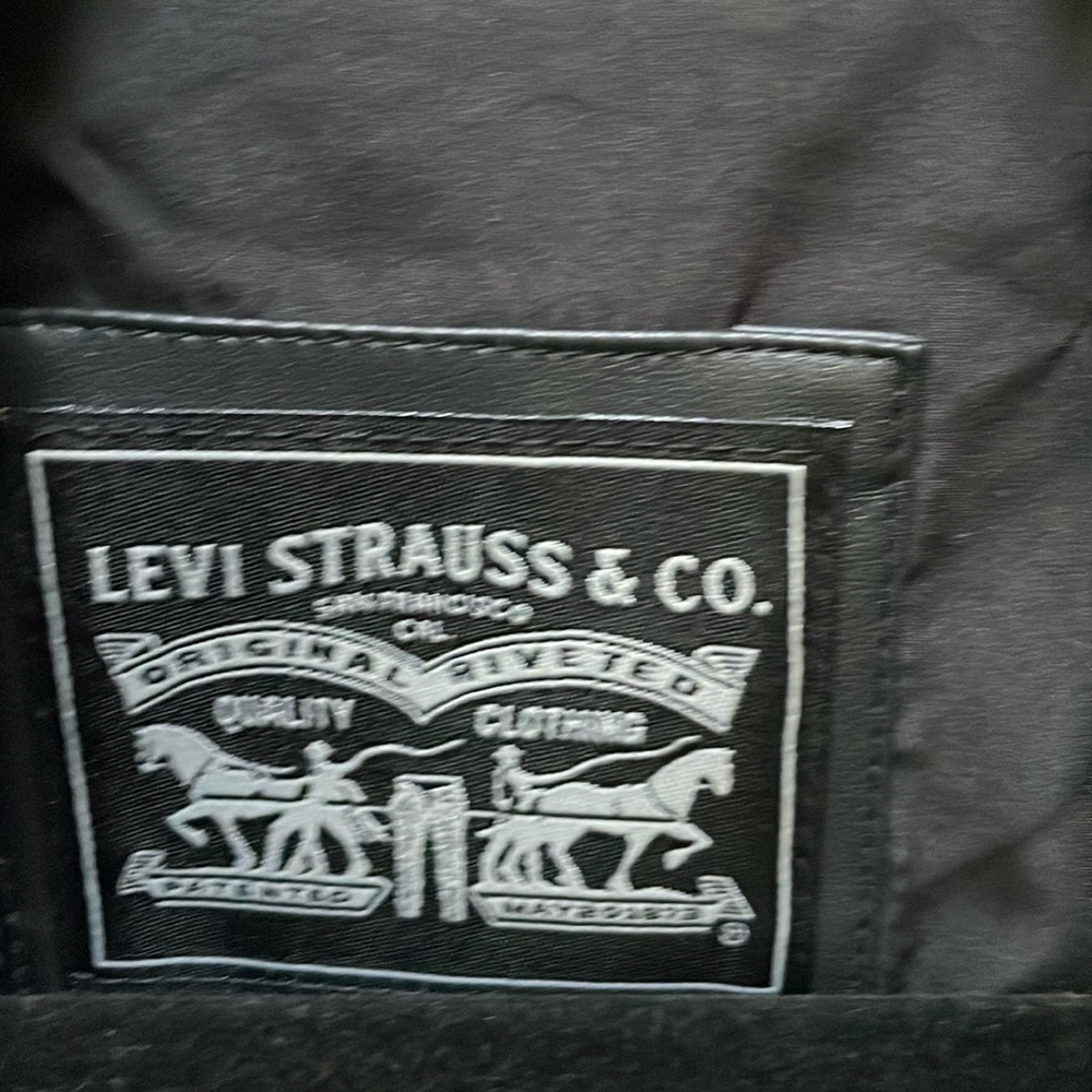 Xs but runs more like small medium new without tags never used faux leather